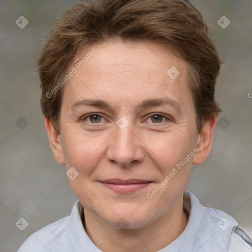 Joyful white adult female with short  brown hair and brown eyes