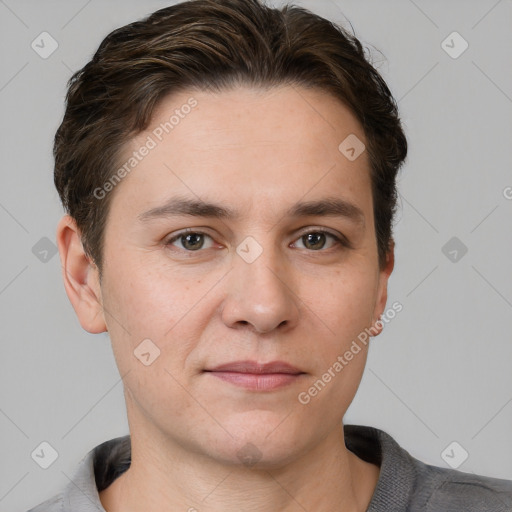 Joyful white young-adult female with short  brown hair and grey eyes