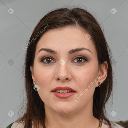 Joyful white young-adult female with medium  brown hair and brown eyes