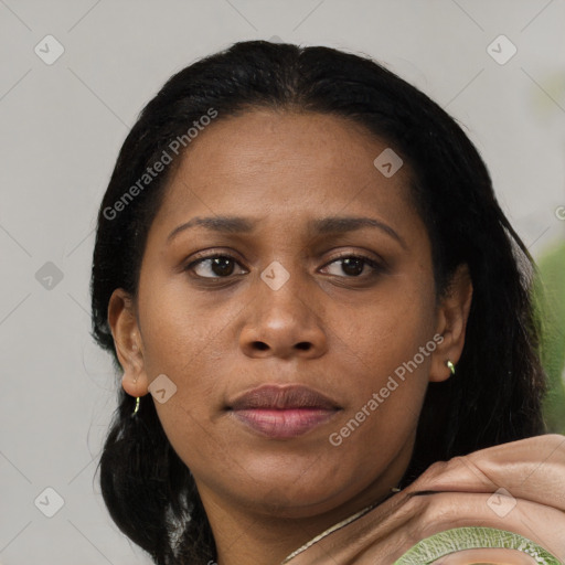Joyful black young-adult female with medium  black hair and brown eyes