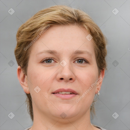 Joyful white adult female with medium  brown hair and grey eyes