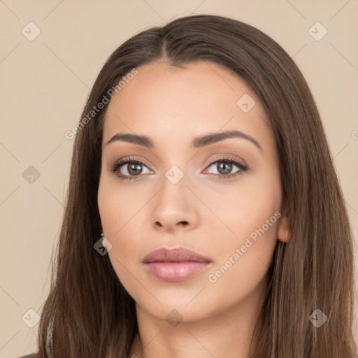 Neutral white young-adult female with long  brown hair and brown eyes