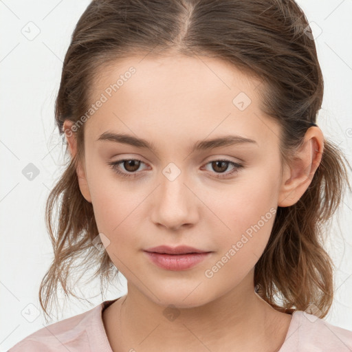 Joyful white child female with medium  brown hair and brown eyes