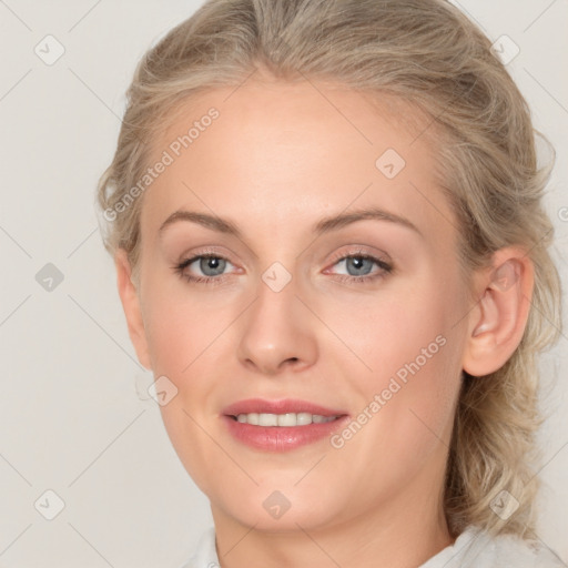 Joyful white young-adult female with medium  brown hair and blue eyes