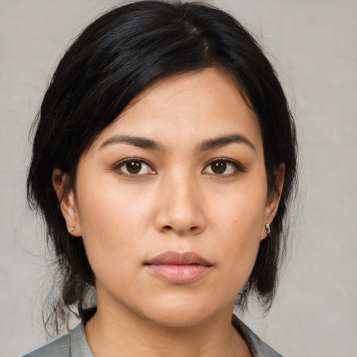 Neutral asian young-adult female with medium  black hair and brown eyes