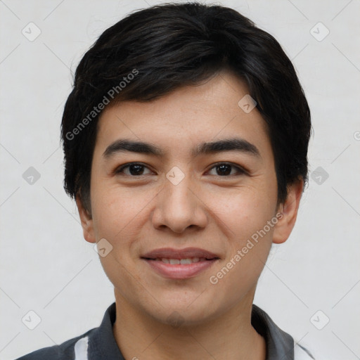 Joyful asian young-adult male with short  black hair and brown eyes