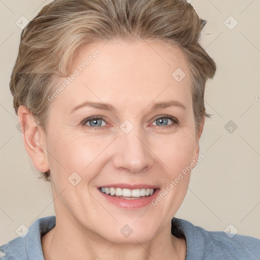 Joyful white adult female with short  brown hair and grey eyes