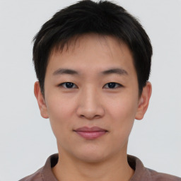 Neutral asian young-adult male with short  brown hair and brown eyes