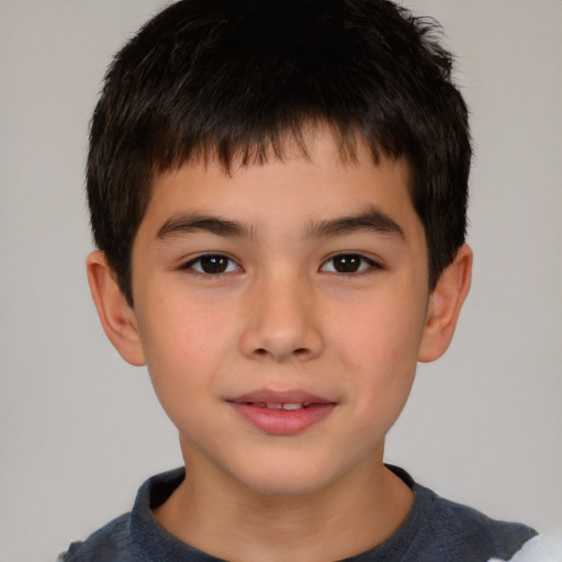 Joyful white child male with short  brown hair and brown eyes