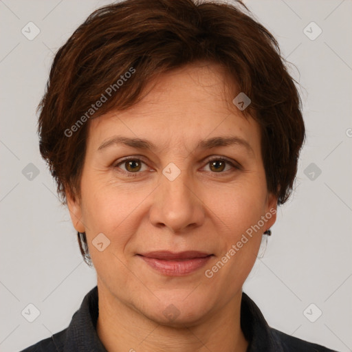 Joyful white adult female with short  brown hair and brown eyes