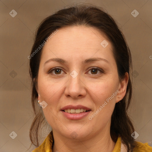 Joyful white adult female with medium  brown hair and brown eyes