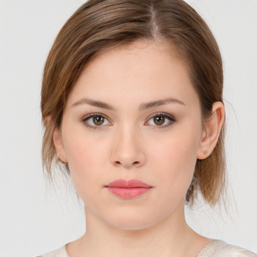 Neutral white young-adult female with medium  brown hair and brown eyes