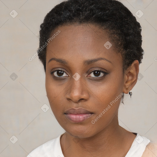 Neutral black young-adult female with short  brown hair and brown eyes