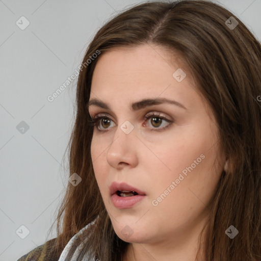 Neutral white young-adult female with long  brown hair and brown eyes