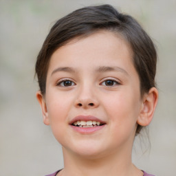 Joyful white child female with short  brown hair and brown eyes