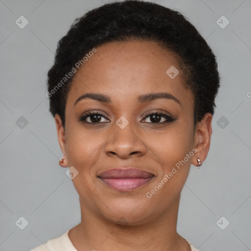 Joyful black young-adult female with short  brown hair and brown eyes