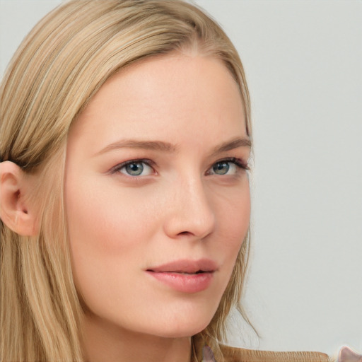 Neutral white young-adult female with long  brown hair and blue eyes