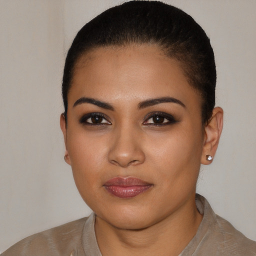 Neutral latino young-adult female with short  brown hair and brown eyes