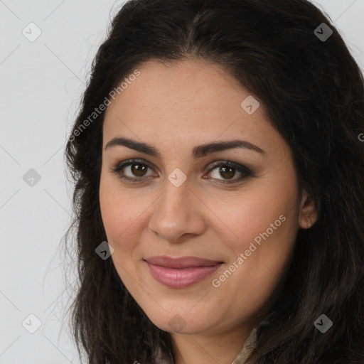 Joyful latino young-adult female with long  brown hair and brown eyes