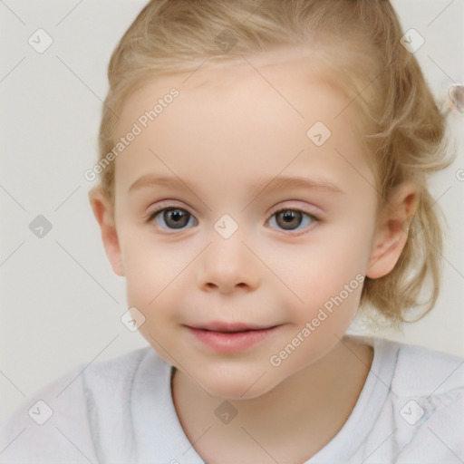 Joyful white child female with short  brown hair and grey eyes