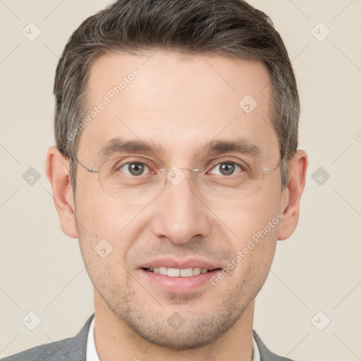 Joyful white adult male with short  brown hair and grey eyes