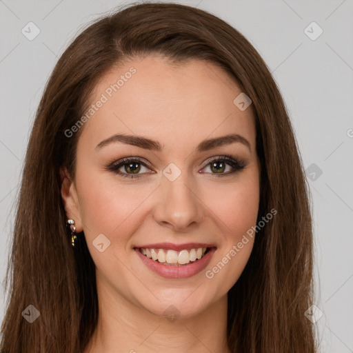 Joyful white young-adult female with long  brown hair and green eyes