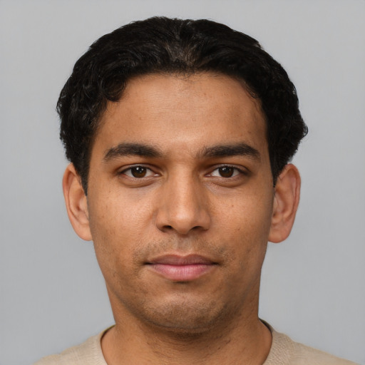 Neutral latino young-adult male with short  black hair and brown eyes