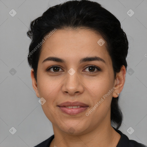 Joyful latino young-adult female with short  brown hair and brown eyes