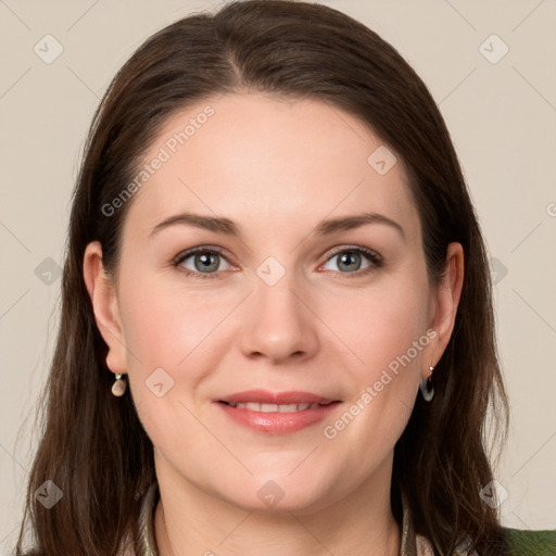 Joyful white young-adult female with medium  brown hair and green eyes