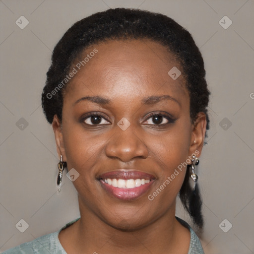 Joyful black young-adult female with short  black hair and brown eyes