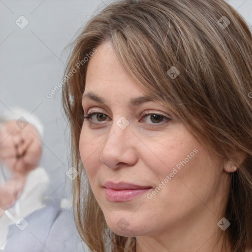 Joyful white adult female with medium  brown hair and grey eyes