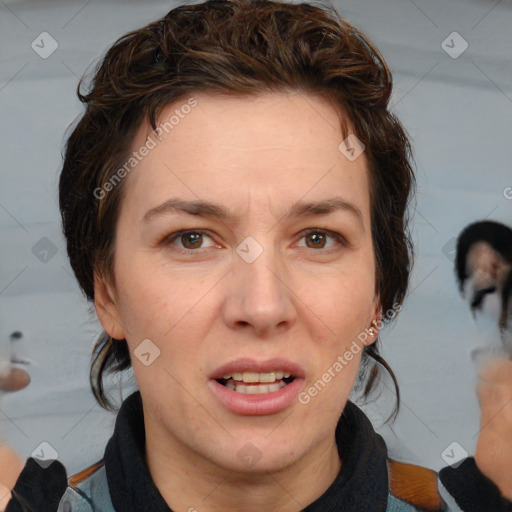 Joyful white adult female with medium  brown hair and brown eyes