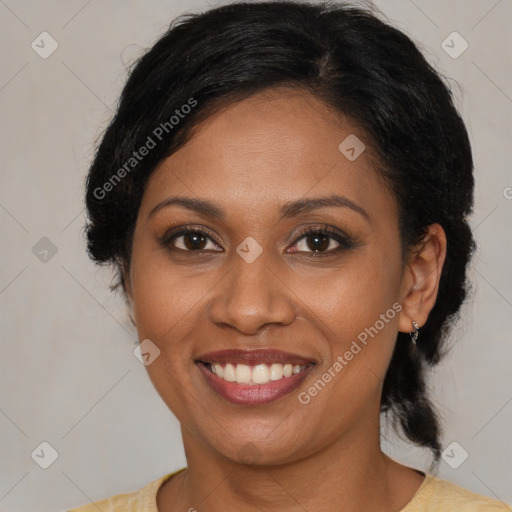 Joyful latino young-adult female with medium  brown hair and brown eyes