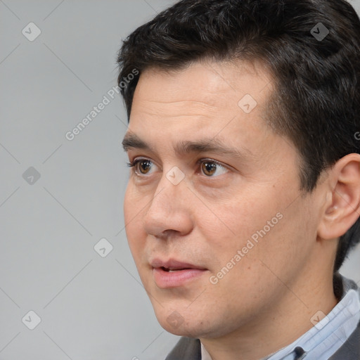 Neutral white adult male with short  black hair and brown eyes