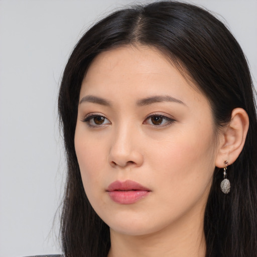 Neutral asian young-adult female with long  black hair and brown eyes