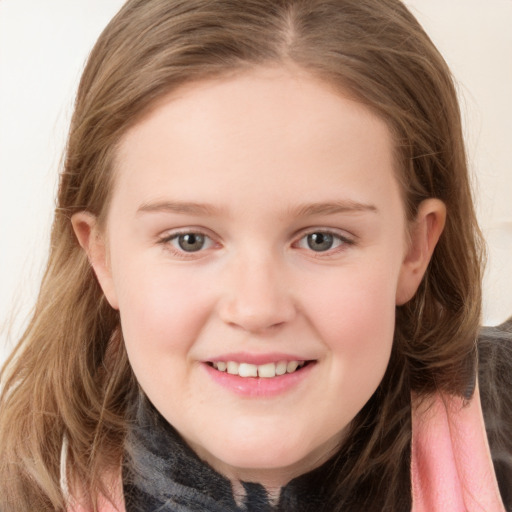 Joyful white child female with medium  brown hair and grey eyes