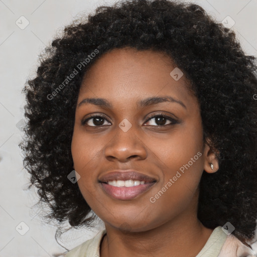 Joyful black young-adult female with medium  black hair and brown eyes