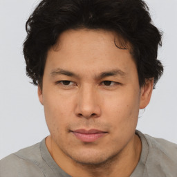 Neutral asian young-adult male with short  brown hair and brown eyes