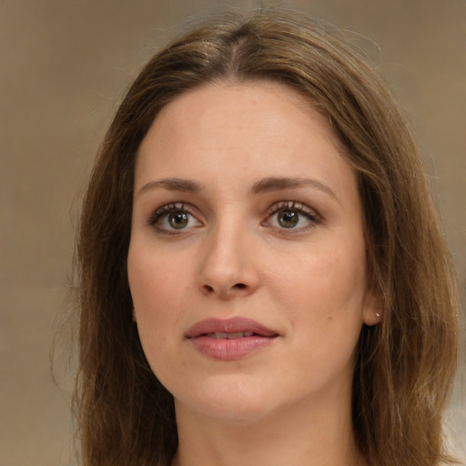 Joyful white young-adult female with medium  brown hair and brown eyes