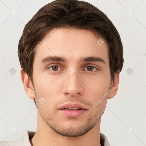 Neutral white young-adult male with short  brown hair and brown eyes