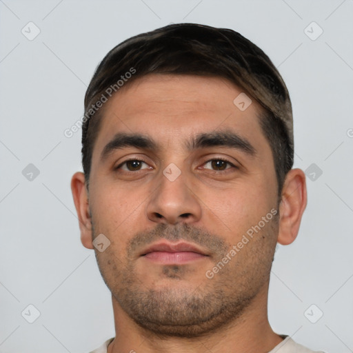 Neutral white young-adult male with short  brown hair and brown eyes