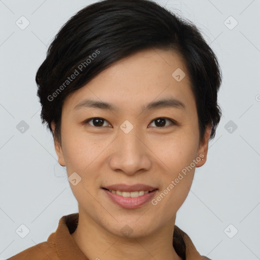 Joyful asian young-adult female with short  brown hair and brown eyes