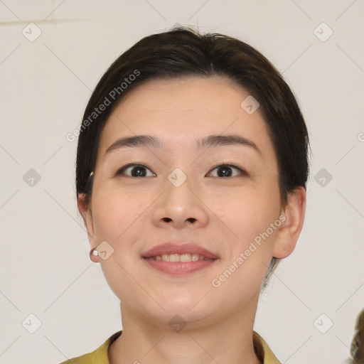 Joyful white young-adult female with short  brown hair and brown eyes