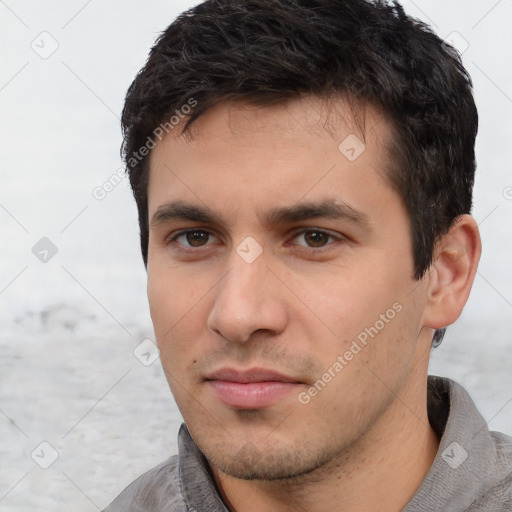 Neutral white young-adult male with short  brown hair and brown eyes