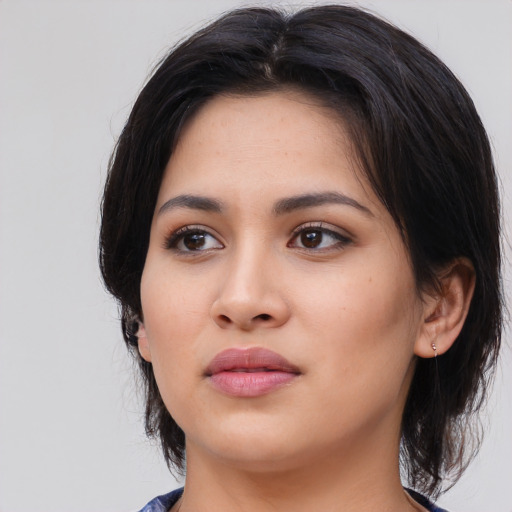 Neutral asian young-adult female with medium  black hair and brown eyes