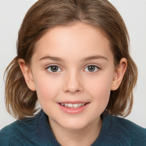 Joyful white child female with medium  brown hair and brown eyes