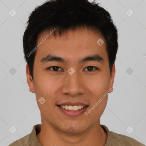 Joyful asian young-adult male with short  black hair and brown eyes