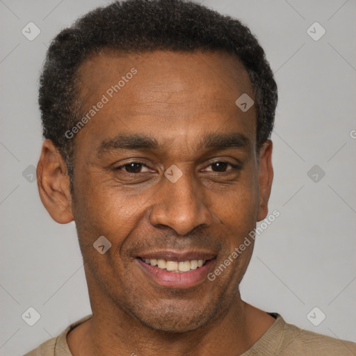 Joyful latino adult male with short  black hair and brown eyes