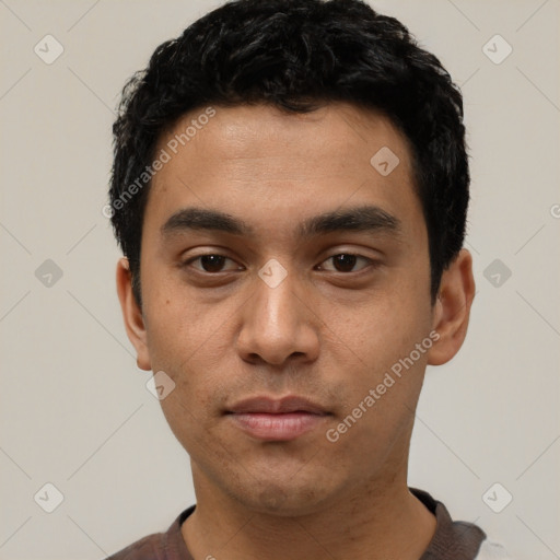 Neutral latino young-adult male with short  black hair and brown eyes