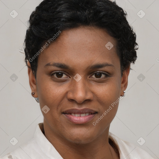 Joyful black young-adult female with short  black hair and brown eyes